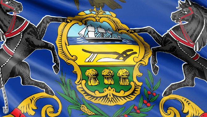 Waving Pennsylvania flag image with gold crest and horses