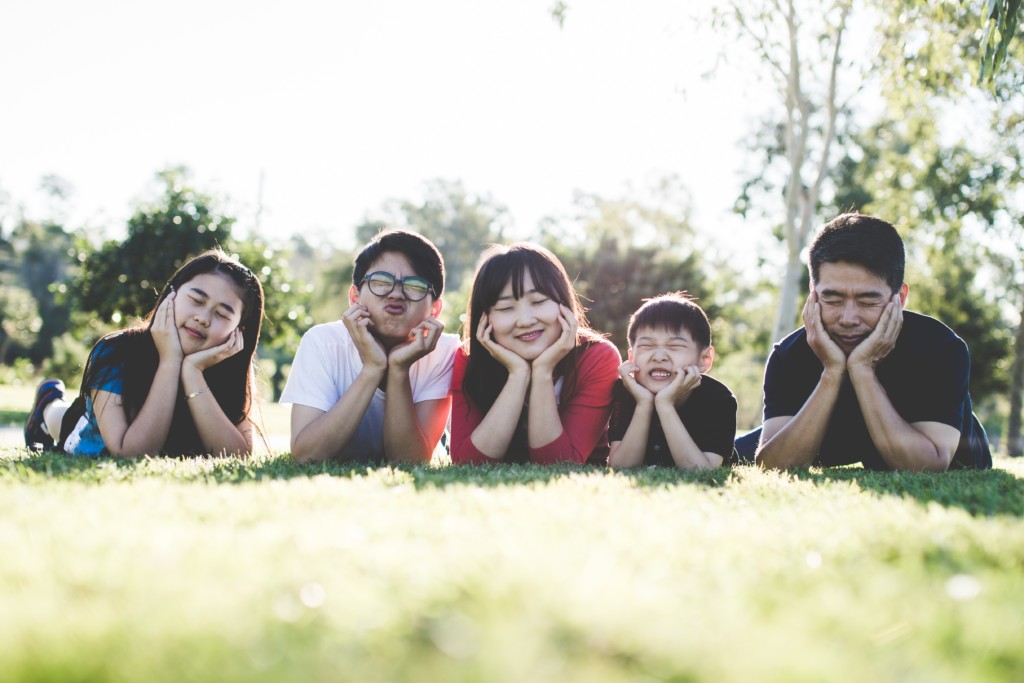 family-outdoor-happy-happiness-160994 (2) family of five laying on grass